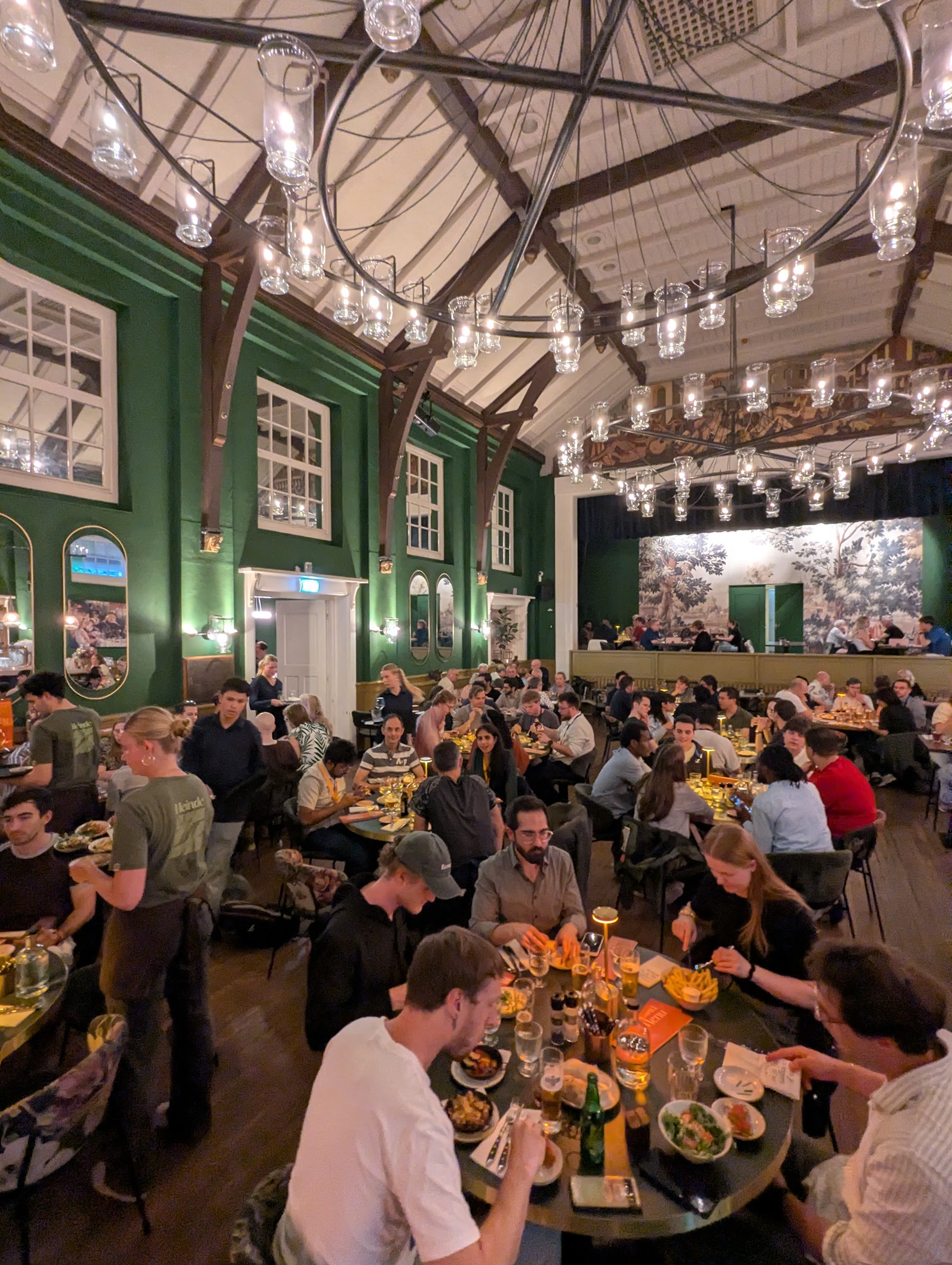 Community over dinner — one of the conference social evenings in Delft.
